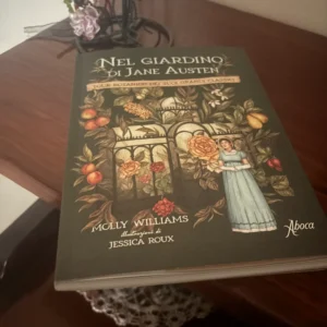 libro di Molly williams il giardino di Jane Austen appoggiato su un mobile 