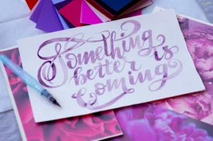 Frase in inglese scritta a mano con la tecnica del lettering
